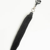 Faux Foxtail Finger Flogger in Black pictured against a white background. 