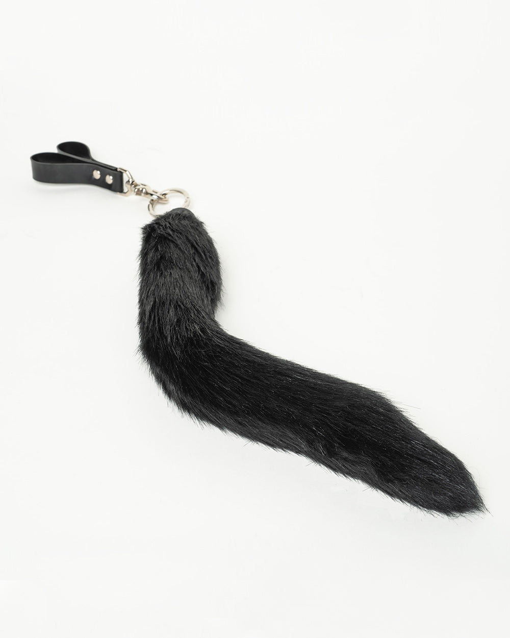 Black faux fur tail flogger on a white background