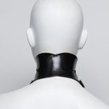 Mannequin wearing a black rubber choker against a light gray background