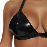 Black latex bikini top worn by a person on a white background
