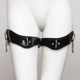 The front of the ilaria double ring thigh cuffs set is shown on a white mannequin in front of a gray background.