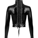 The back of the black latex restraint top is shown against a white background. Black lace and a zipper run along the entire back.
