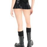 A model is shown from behind wearing the black latex angel skirt standing in front of a white background. 