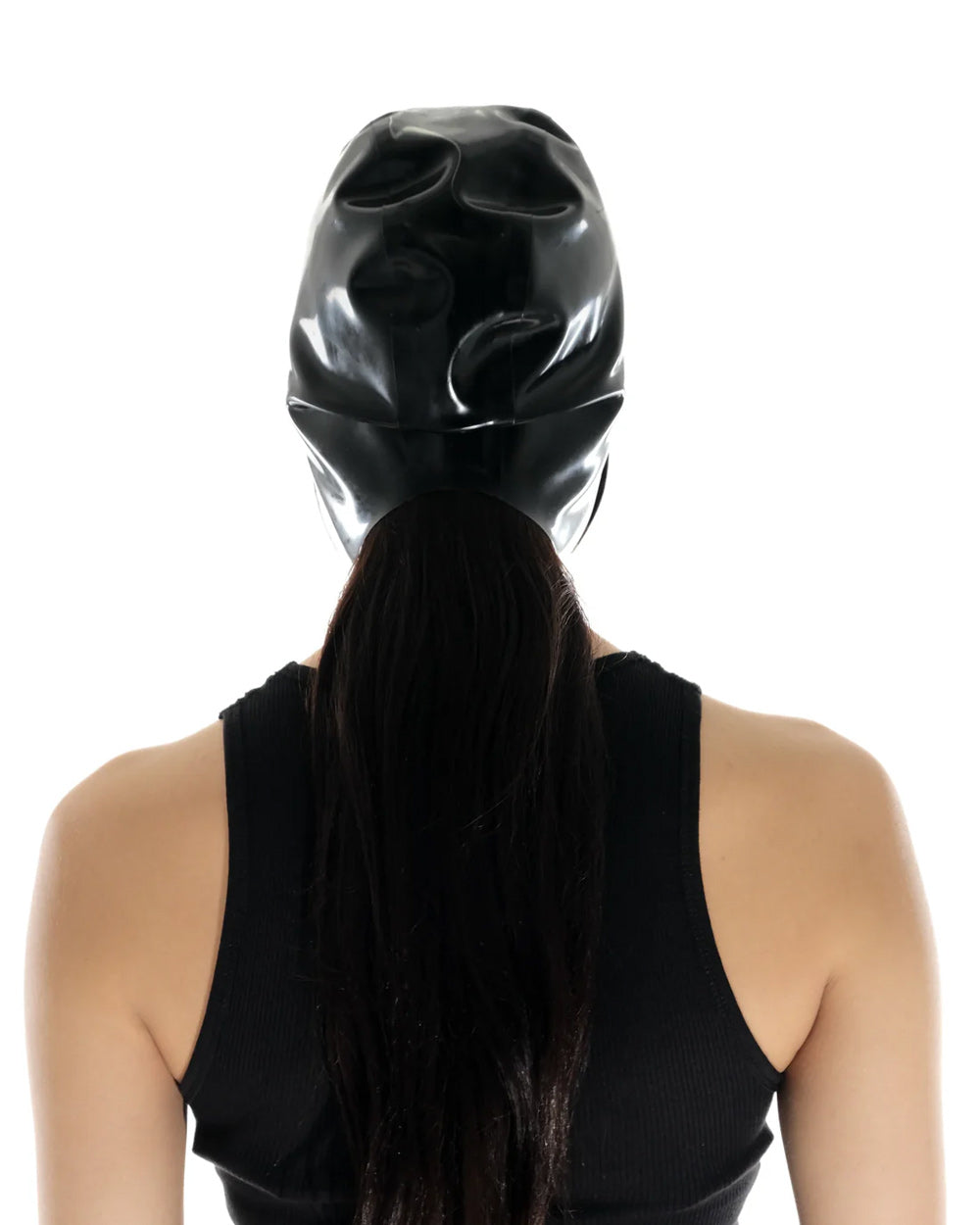 A brunette model is shown from the back wearing the black latex bonnet against a white background.