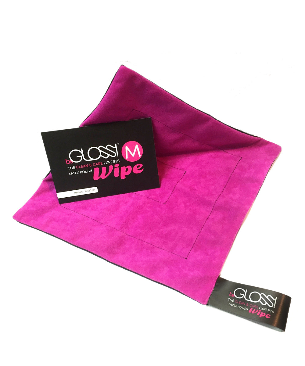 Pink and black GLOSSI Wipe on a white background/