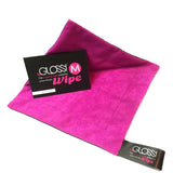 Pink and black GLOSSI Wipe on a white background/