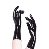 Black glossy gloves worn on a white background