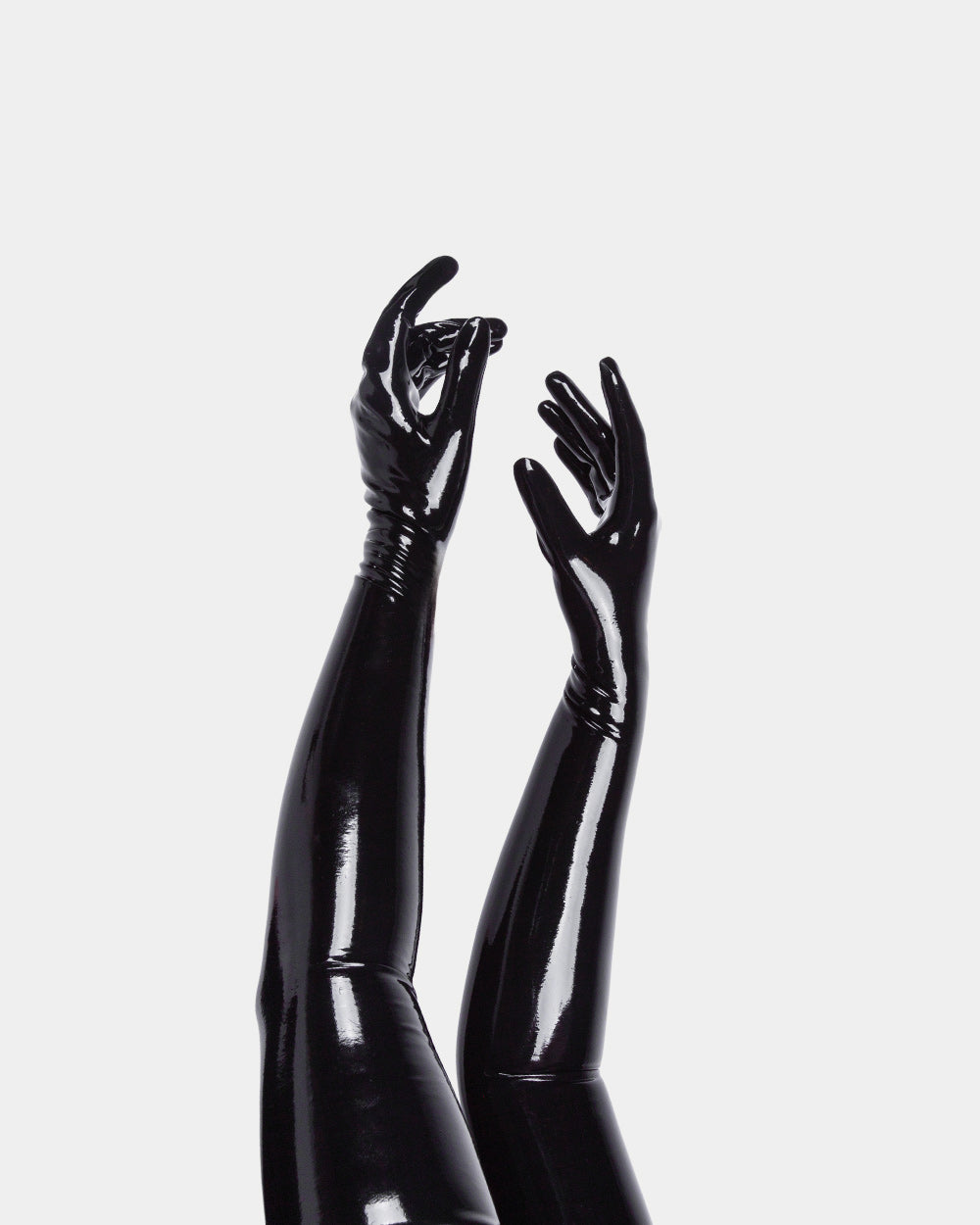 Black glossy opera length gloves on a white background