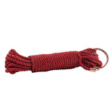 Red rope with a metal clip on a white background