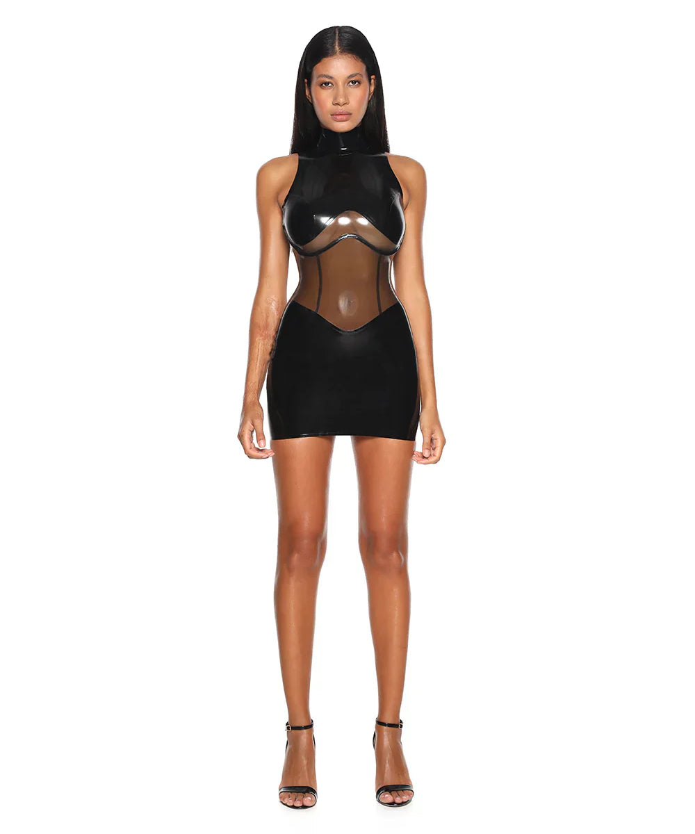 A model is shown wearing the black casey latex dress standing in front of a white background.