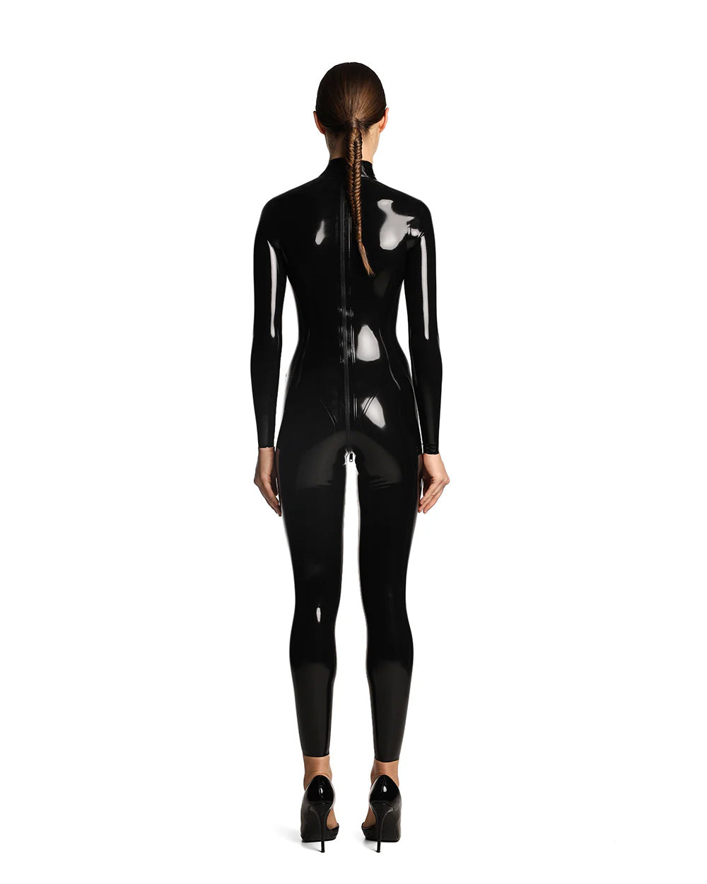 The back of a model is shown wearing the Black kinetic latex catsuit in front of a white background.