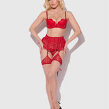 Woman wearing a red lingerie set on a white background