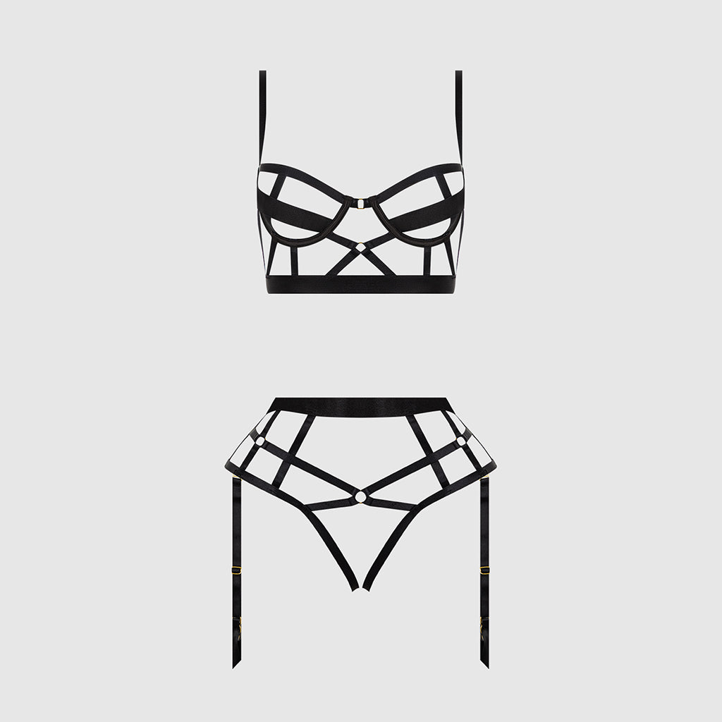 Black lace lingerie set on a light gray background