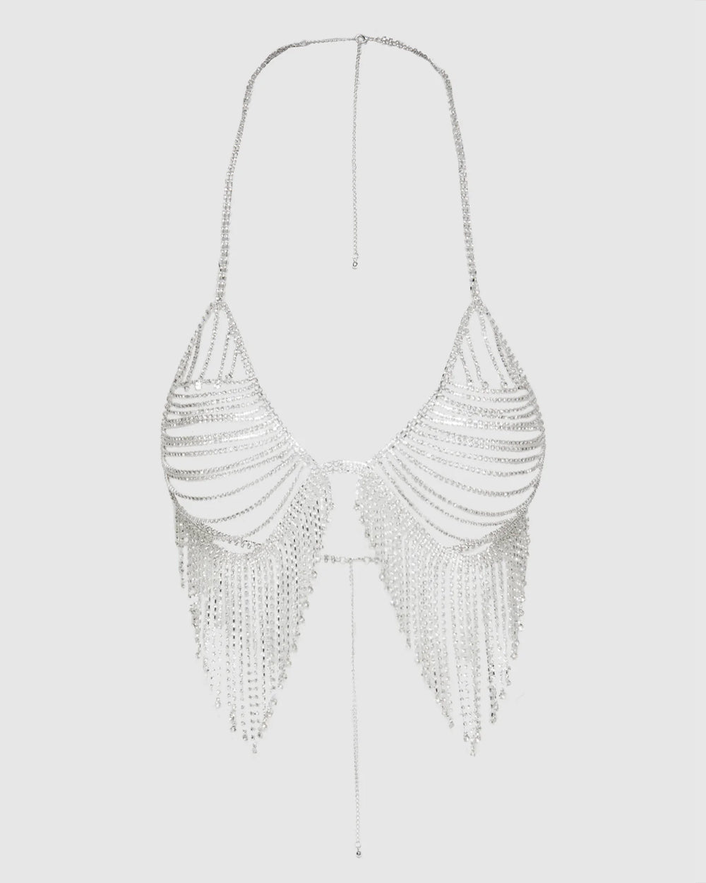 Silver beaded halter top on a light gray background