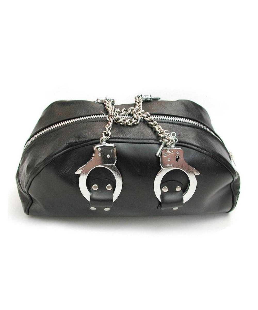 The leather doctor bag with handcuff handles is shown on a white background