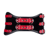 A close-up of the Firecracker Patent Leather Waist Cincher is shown.  3 rows of red buckles connect the edges of the waist cincher.