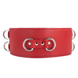 A red Premium Garment Leather Locking Waist Cuff is shown from the back against a blank background. The back of the cuff has two D-rings next to each other, centered in the middle of the cuff.