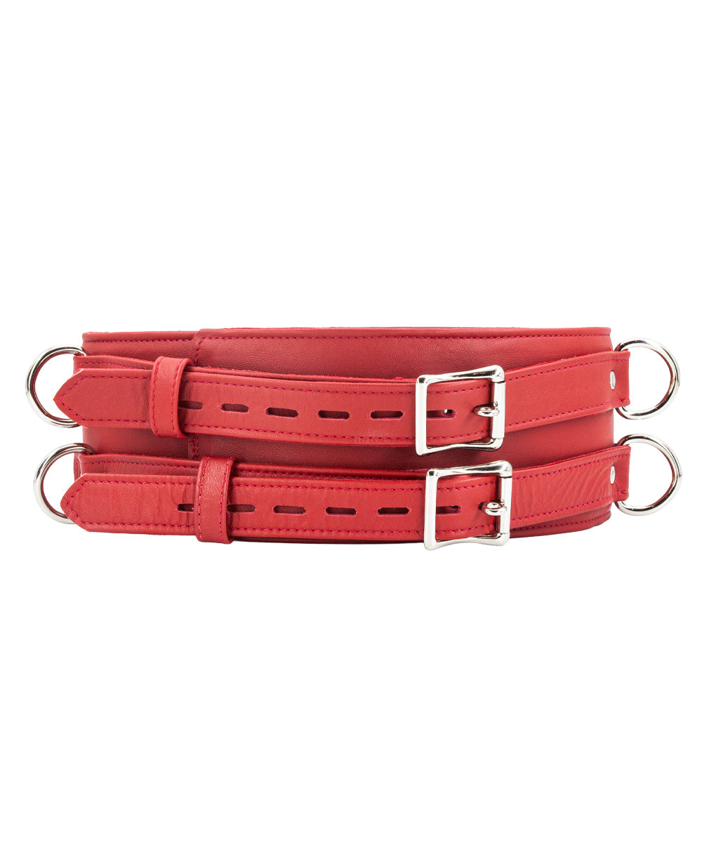 A red Premium Garment Leather Locking Waist Cuff is shown from the front against a blank background. The back of the cuff has two D-rings next to each other, centered in the middle of the cuff.
