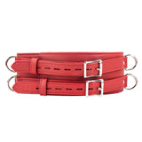 A red Premium Garment Leather Locking Waist Cuff is shown from the front against a blank background. The back of the cuff has two D-rings next to each other, centered in the middle of the cuff.