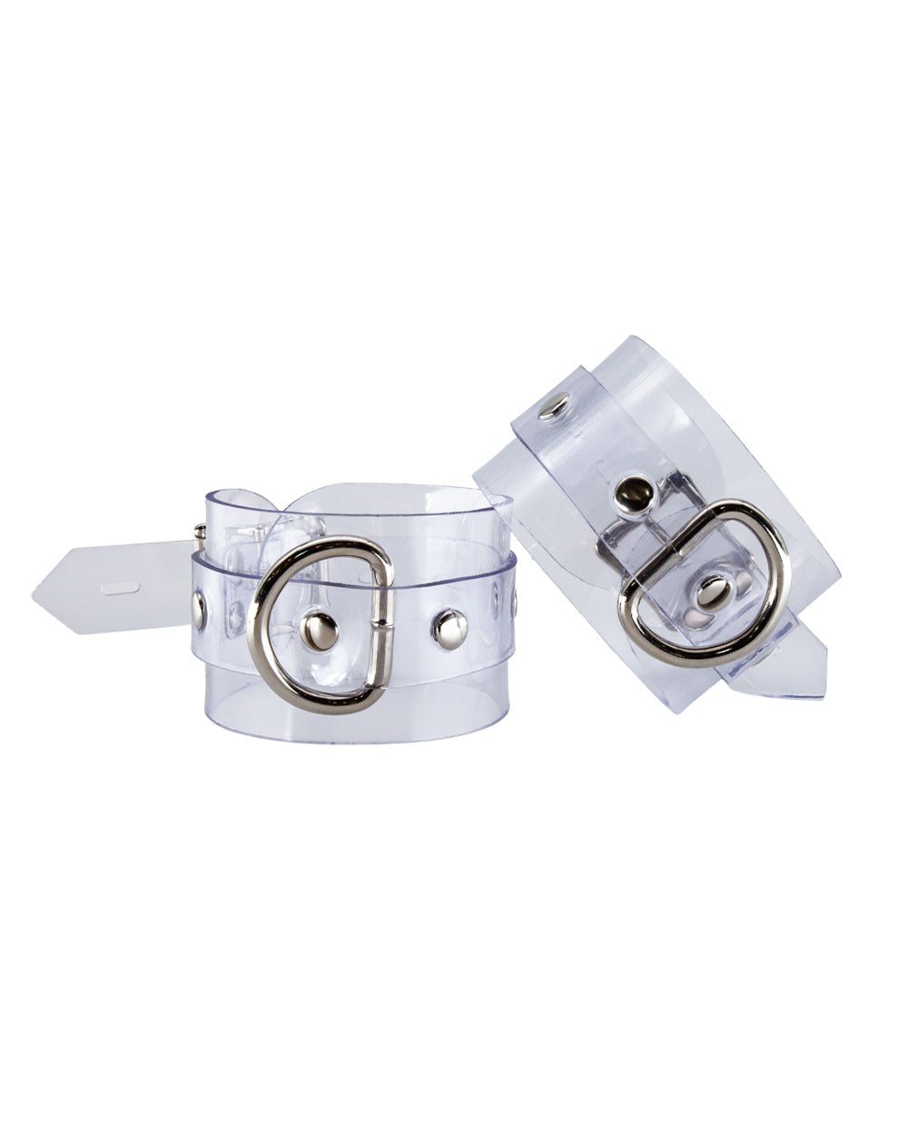 The Clear CTRL Clear Vinyl Wrist Cuffs are shown against a blank background. The cuffs are completely transparent with metal hardware. They each have a lockable buckle with an adjustable strap and a D-ring.