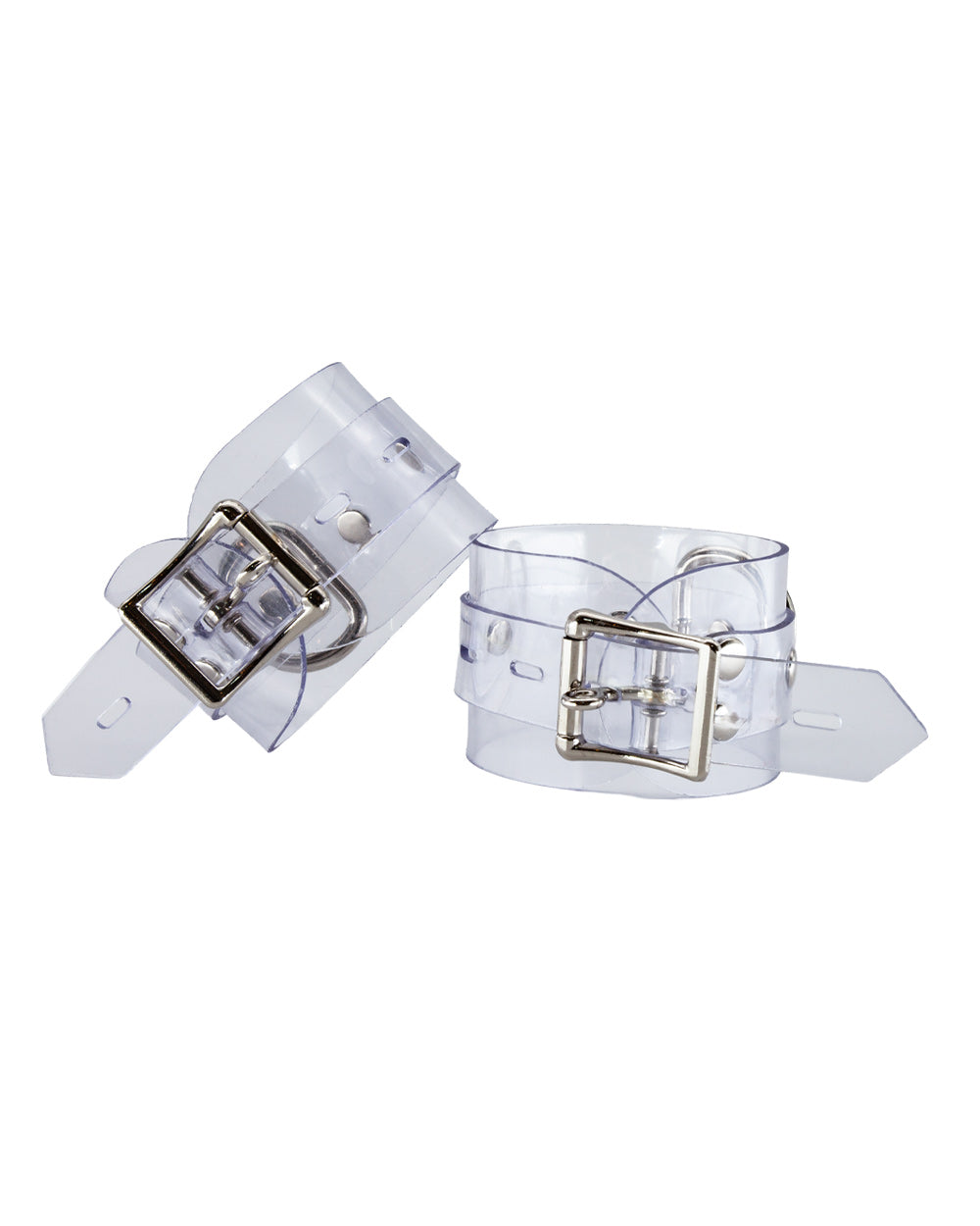 The Clear CTRL Clear Vinyl Wrist Cuffs are shown from the back against a blank background. The cuffs are completely transparent with metal hardware. They each have a lockable buckle with an adjustable strap and a D-ring.