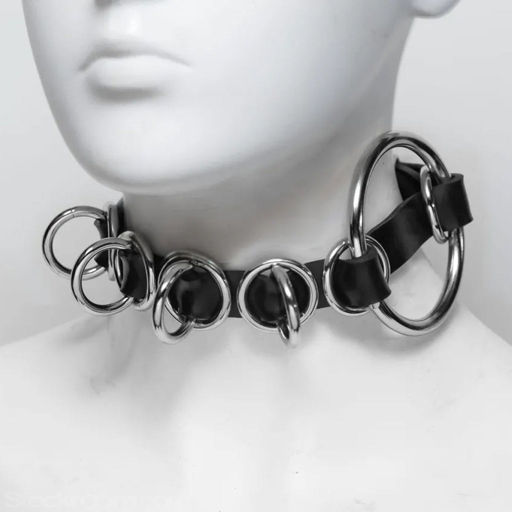 Black and silver choker necklace on a mannequin head against a white background