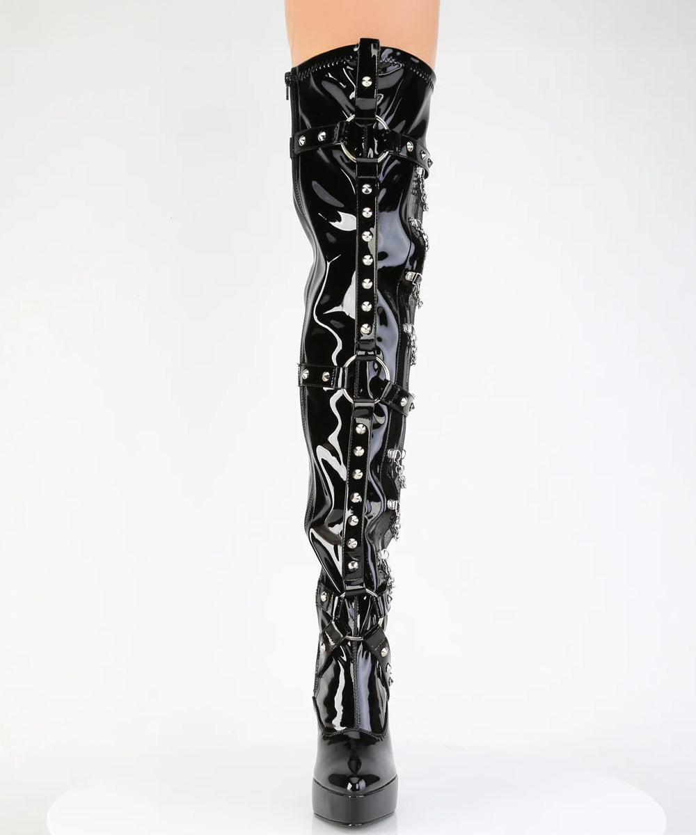 Black patent leather knee-high boot with decorative studs on a white background