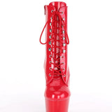 Red high-heeled boot with lace-up design on a white background