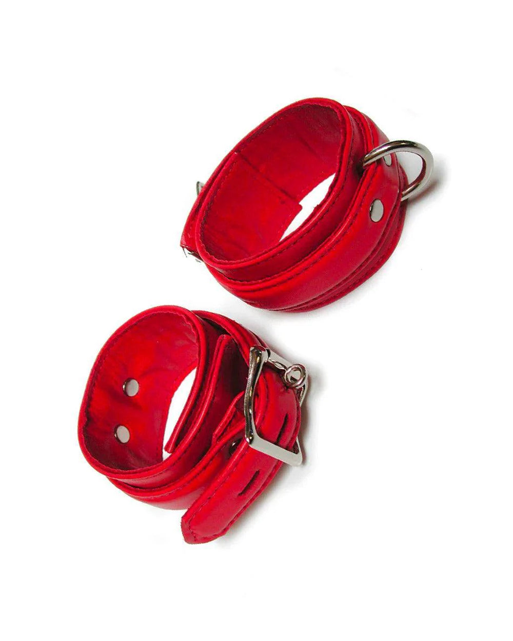 A pair of red Premium Garment Leather Ankle Cuffs are displayed against a blank background. They are made of red leather with silver hardware. Each cuff has one D-ring, and they fasten with lockable buckles.