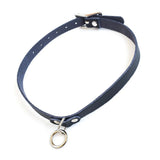 The Vondage Choker With O-Ring is shown against a blank background. It is made of a thin piece of black vegan leather and metal hardware.